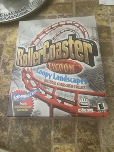 RollerCoaster Tycoon Loopy Landscapes & Corkscrew Follies Pc Factory Sealed - Picture 1 of 21
