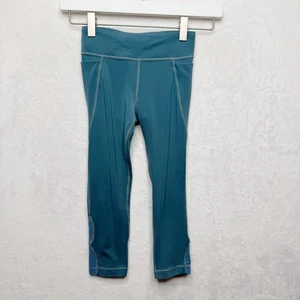 ATHLETA GIRL Truth Be Told Stash Pocket Leggings Mesh Cutout Teal Blue Sz 7 - Picture 1 of 6