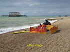 Photo 6x4 Lifeguards on Brighton beach After a hot summer the weather is  c2013