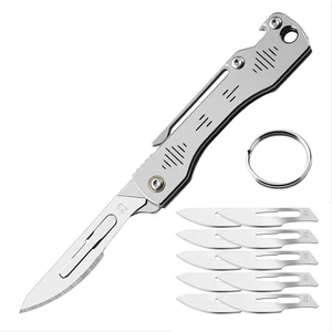 Mini Coltello Pieghevole Con Clip, Bisturi, Coltello Portachiavi, 10 Lame Interc - Foto 1 di 12