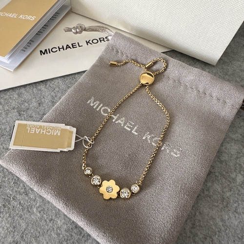 BRACCIALE MICHAEL KORS PLACCATO ORO REGOLABILE FIORI