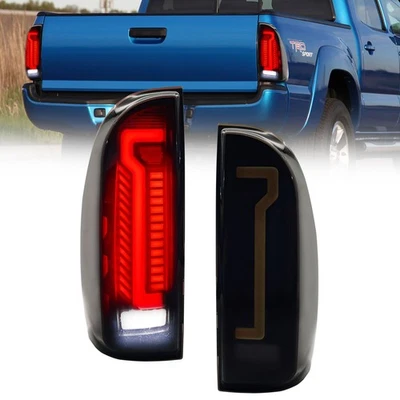 Par de luces traseras LED para Toyota Tacoma 2005-2015 luces intermitentes ahumadas Foto 1 de 4