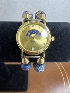 Reloj para mujer Ronica fase lunar con fecha cara dorada correa con cuentas azules batería nueva - Imagen 1 de 9