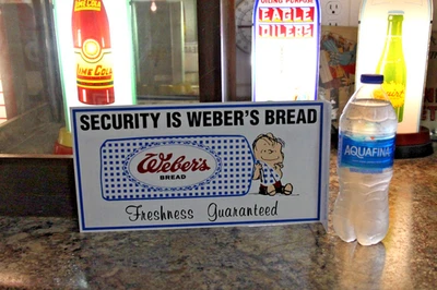 NOS SCARCE 1950s WEBER'S BREAD 2-SIDED PAINTED METAL FLANGE DEALER SIGN PEANUTS - Image 1 of 4