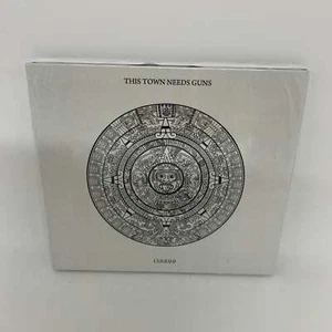 Álbum de CD This Town Needs Guns TTNG 13.0.0.0 NUEVO SELLADO franqueo gratuito - Imagen 1 de 4