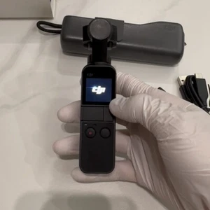 DJI Osmo Pocket-Handheld 3-Axis Gimbal Stabilizer with integrated Camera - Picture 1 of 12