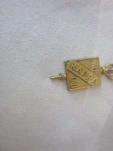 Llave de hermandad Mu Kappa Tau llena de oro - Imagen 1 de 3