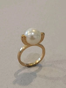 Kunstperlen Spinner Ring goldfarben Größe 7,5 - Bild 1 von 2