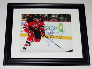 JAMIE LANGENBRUNNER AUTOGRAPHED 8X10 COLOR PHOTO (FRAMED & MATTED) - NJ DEVILS! - Picture 1 of 2