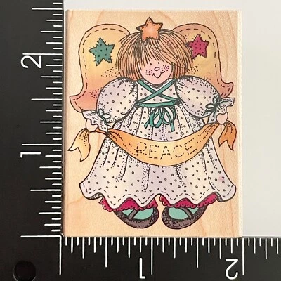 Sello de goma montado en madera Hero Arts Peace Angel E1270 Foto 1 de 4