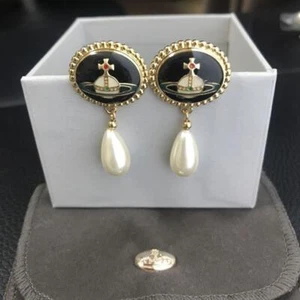 Vivienne Westwood Ohrringe Pierce Emaille Knopf Perle gold schwarz IM BOX - Bild 1 von 6