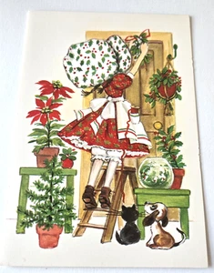 Tarjeta de Navidad vintage niña antigua decoración con muérdago y plantas - Imagen 1 de 3