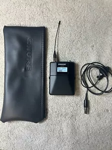 Shure wireless bodypack transmitter ULXD1 L50 Freq. 632-696Mhz w/ lapel mic - Picture 1 of 3