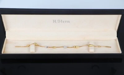 Brazalete estación de bloqueo de seguridad de diamantes pavé redondo de oro blanco amarillo de 18 quilates H. Stern Foto 1 de 4