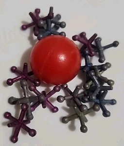Vintage Toy Game of Jacks with Old 1 Rubber Ball & 15 Multi-colored Metal Jacks - Imagen 1 de 6