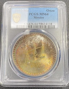 1980 MEXICO SILVER 1 OZ SCALE ONZA PCGS MS 64 STUNNING COLOR RAINBOW TONING - Picture 1 of 5