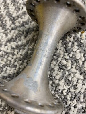 Buje delantero 93 ACS eje 3/8 36H usado plateado Foto 1 de 3