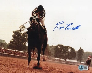Ron Turcott Autografiado Firmado SECRETARÍA CARRERAS DE CABALLOS Jockey 8x10 Foto BAS - Imagen 1 de 2