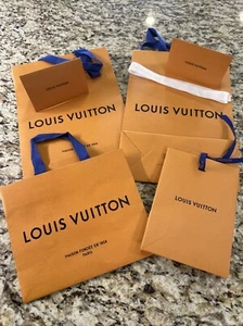 Set LOUIS VUITTON Einkaufstaschen aus Papier und 2 Quittungsumschläge - Bild 1 von 10