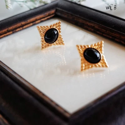 Pendientes estrella negra: estilo vintage y regalos para ella Foto 1 de 2