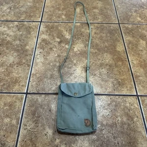 Fjallraven “Pocket” Sling Bag Green Small Crossbody Mini Shoulder Bag worn - Picture 1 of 8