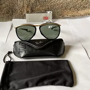 OCCHIALI DA SOLE RAY-BAN B&L U.S.A OLYMPIAN II 5 1/4 NERI E ORO G-15 VINTAGE ANNI 80 - Foto 1 di 24