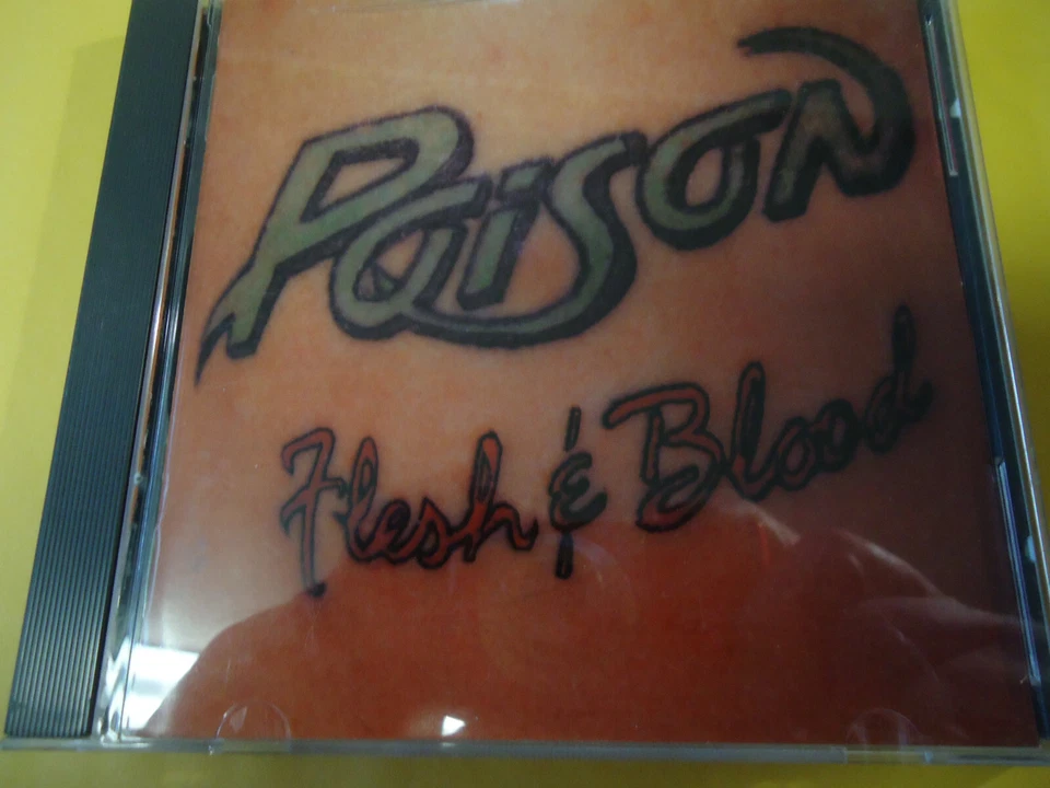 POISON - Flesh & Blood - CD  1990 Canada - Image 1 of 1