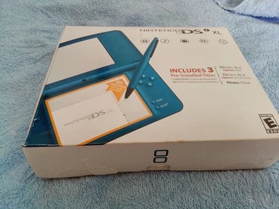 Nintendo DSi XL original box with inserts & charger NEW - Image 1 of 4