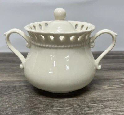 Godinger & Co. Ivory Ceramic Sugar Bowl with Lid & Handles–Pierced Rim, 5.5”x6” - Image 1 of 4