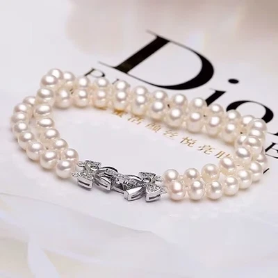 Elegante pulsera de perlas blancas mar sur 7-8 mm 7,5-8" dos hilos Foto 1 de 3