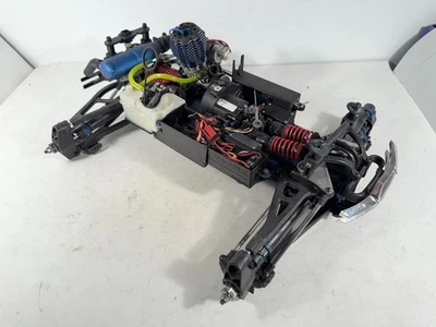 Traxxas Revo 3.3 Nitro 1/8 Monster Truck Roller Slider Chassis / Engine - Image 1 of 4