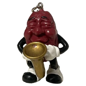 VINTAGE 1987 KALIFORNIEN ROBENFIGUR 2" SAXOPHON SPIELER SCHLÜSSELANHÄNGER PVC KALRAB - Bild 1 von 6