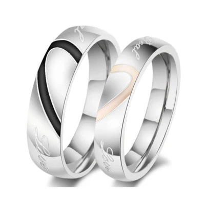 RINGSET PARTNERRINGE EDELSTAHL POLIERT GOLDFARBEN SCHWARZ "REAL LOVE" - Bild 1 von 4
