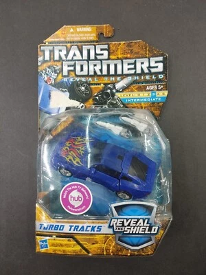 TRANSFORMERS REVEAL THE SHIELD DELUXE TURBO TRACKS  COMPLETE IN PACKAGE   LR9 - Image 1 of 4