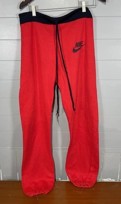 Pantalones deportivos vintage Nike Sportswear años 70 80 naranja Swoosh RARO hechos en EE. UU. L Foto 1 de 4