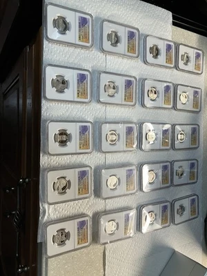 Complete 2010 Graded Banned Label Quarters Ngc  All (20) Clad & Silver - Image 1 of 4