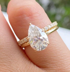 Anillo solitario de pera moissanita con banda de eternidad apilable conjunto de anillos de boda de oro - Imagen 1 de 7