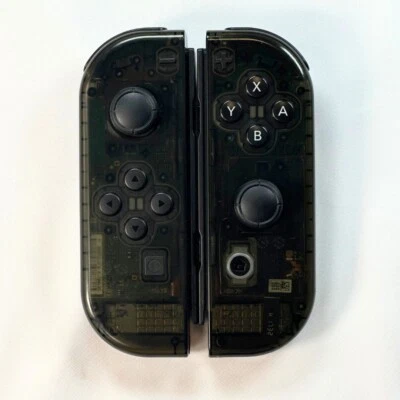 Never Drift Hall Effect Clear Black Nintendo Switch JoyCons OEM Authentic - Image 1 of 4