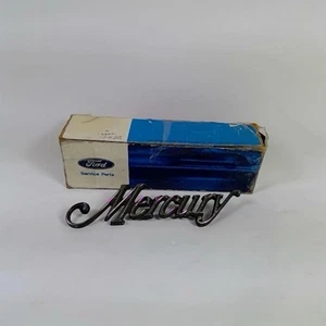 NOS OEM 1973 MERCURY MONTEGO D3GY-16604-A HOOD EMBLEM - Picture 1 of 7