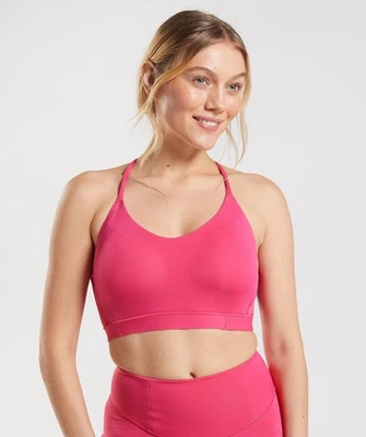 Sujetador deportivo Gymshark Studio rosa para mujer talla pequeña entrenamiento gimnasio deporte ocio Foto 1 de 4
