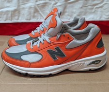 new balance 100 men orange