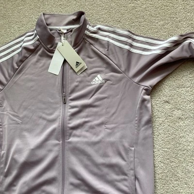 Adidas Mujer’s Essentials Calentamiento Delgado 3 Rayas Chaqueta de Pista Púrpura Claro Grande Foto 1 de 4