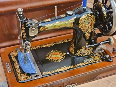 Rusby hand crank Vintage sewing machine with instruction manual - image 1 of 4