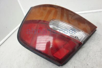 Luz trasera derecha Nissan Altima 1998-1999 sedán 4 puertas 26554-9E025 Foto 1 de 4