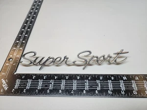 EMBLEMA GUARDABARROS CHEVROLET IMPALA SUPER SPORT CIRCA '65 3866070 - Imagen 1 de 8