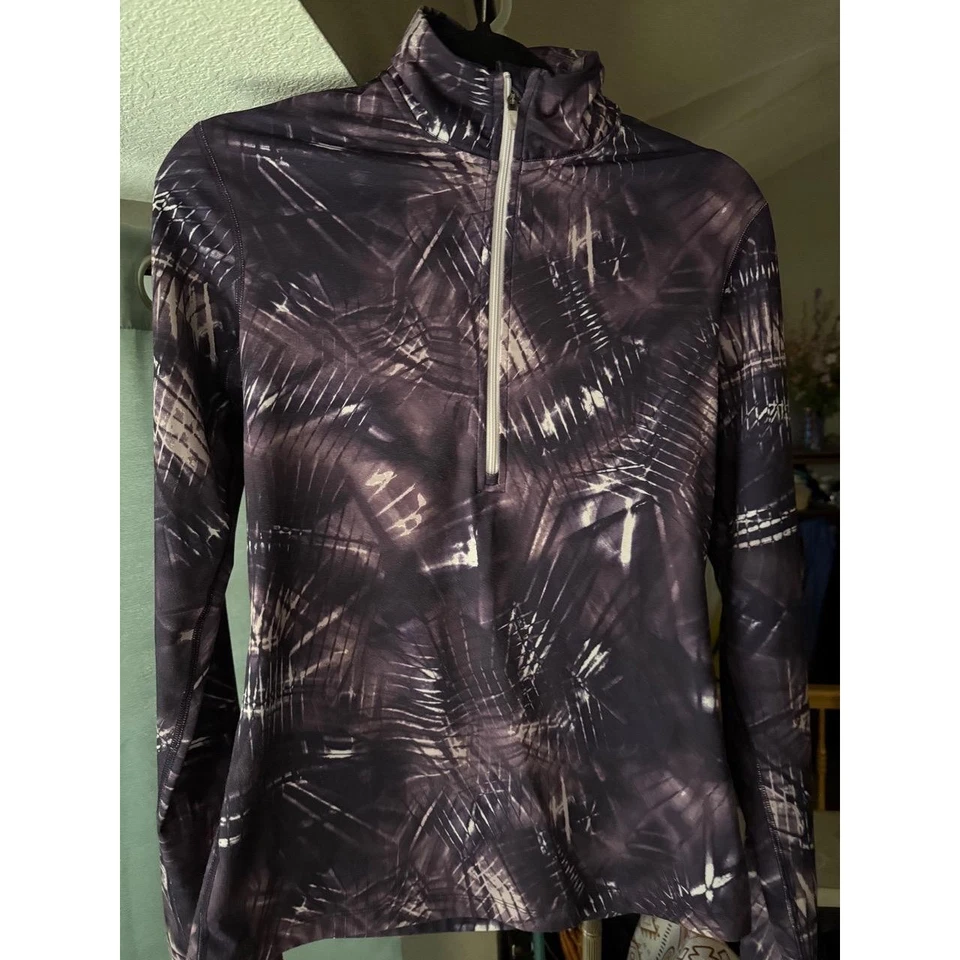 Pullover Nike para mujer grande púrpura negro estampado DriFit cuarto cremallera Foto 1 de 4