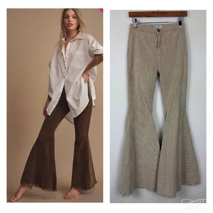 Pantalones acampanados de pana Free People para mujer talla 26 beige boho estilo retro festival - Imagen 1 de 15