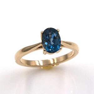 Natural London Blue Topaz 14KT Yellow Gold 7x5mm Oval Ring (Sizes 4-9) - Picture 1 of 2