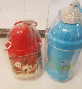 2 Water juice bottles with Christmas design and adjustable strap £11.50 - Picture 1 of 6