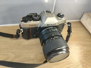 Nikon FM10 analoge Spiegelreflexkamera 35 mm mit Objektiv 35–70 mm F3,5–4,8 mit Nikon Tasche - Bild 1 von 21